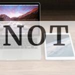 Macbook Pro Beside White Ipad