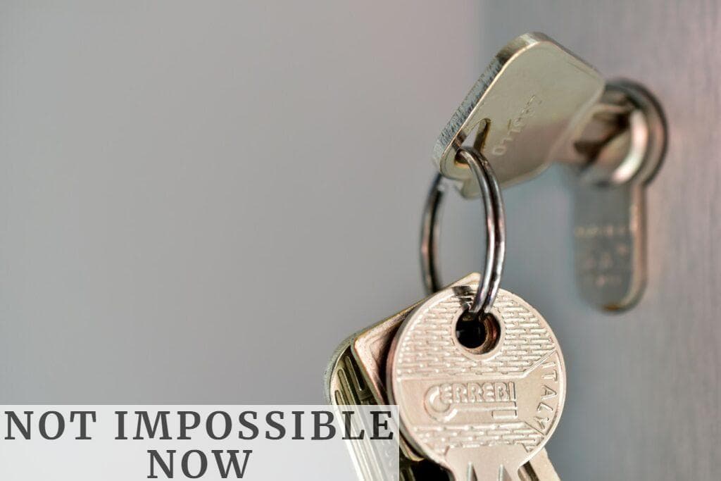 a bunch of keys that are on a hook