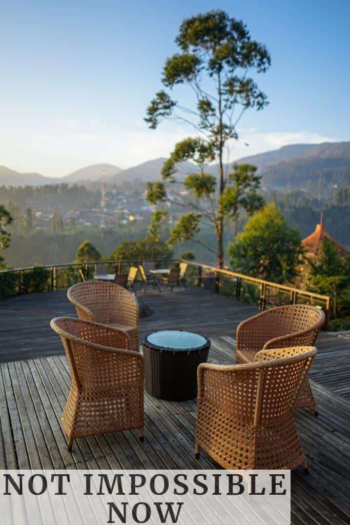 four brown wicker chairs